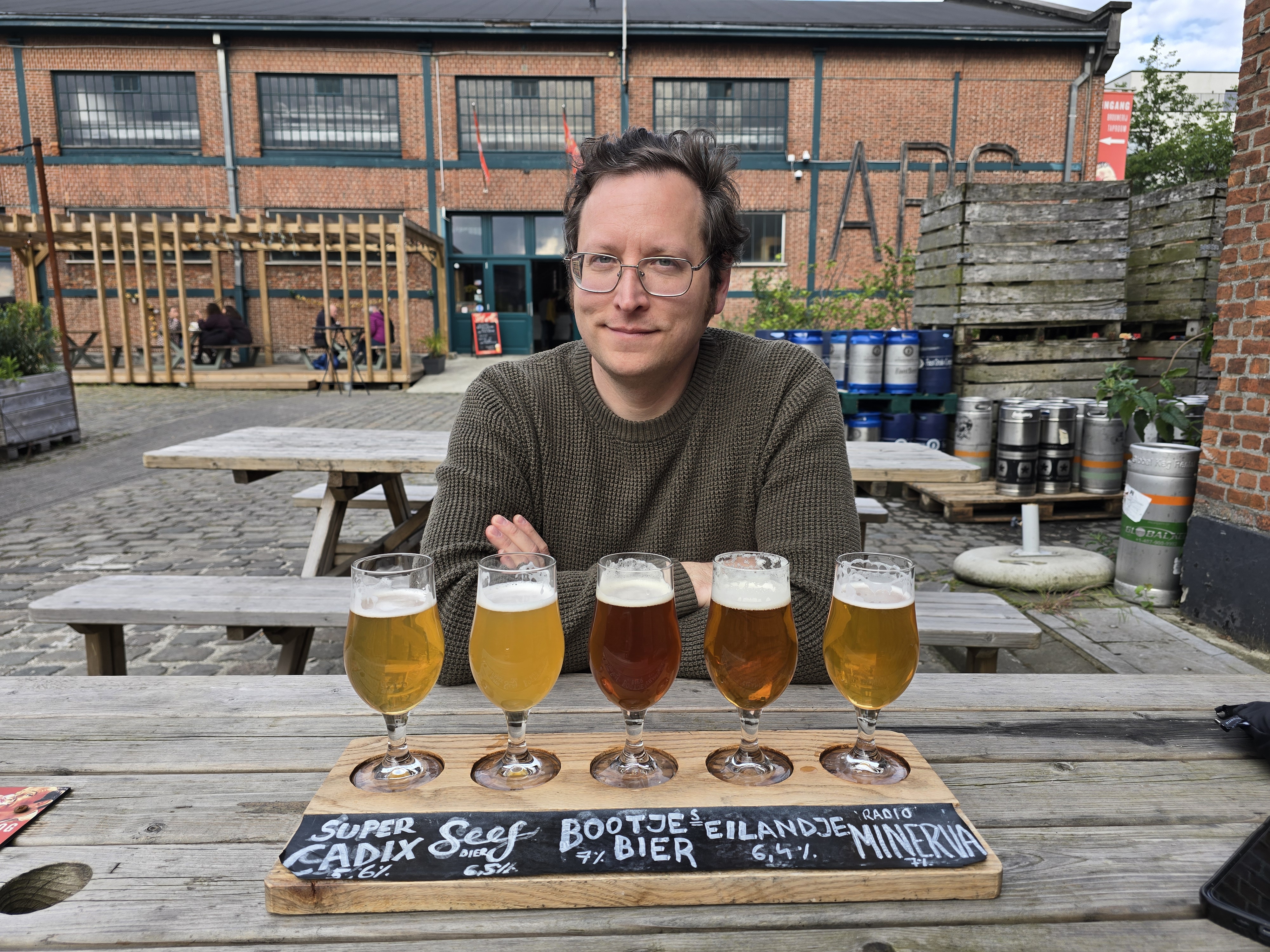 Sitting and enjoying a flight at the Antwerpse Brouw Compagnie